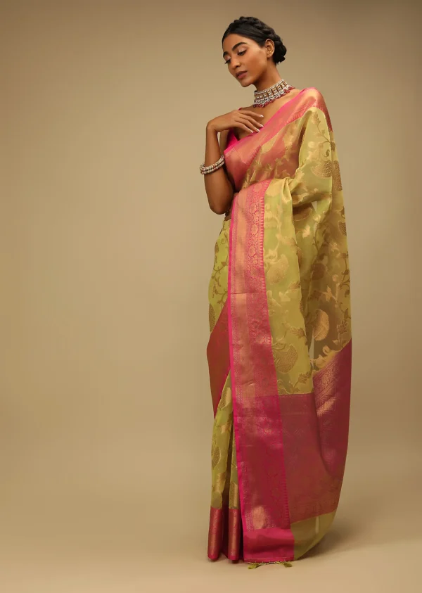 Celery Green Saree In Organza Silk With Golden Brocade Woven Floral Jaal And Magenta Border Design