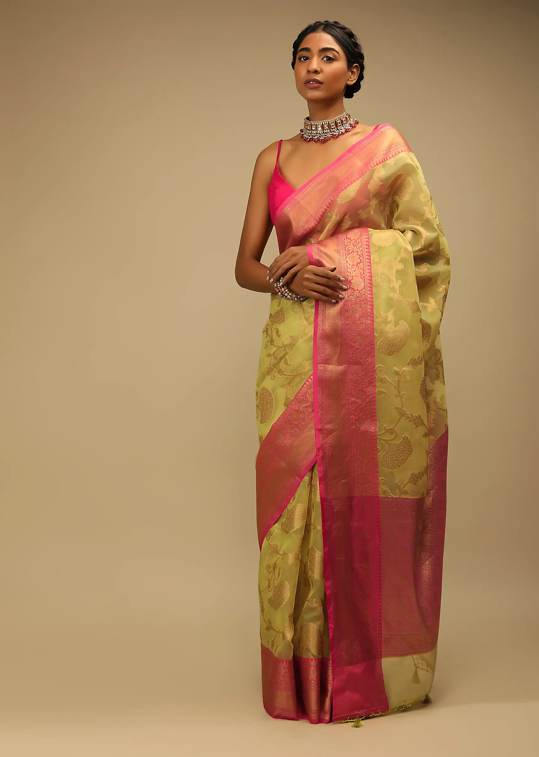 celery_green_saree_in_organza_silk_with_golden_brocade_woven1.webp