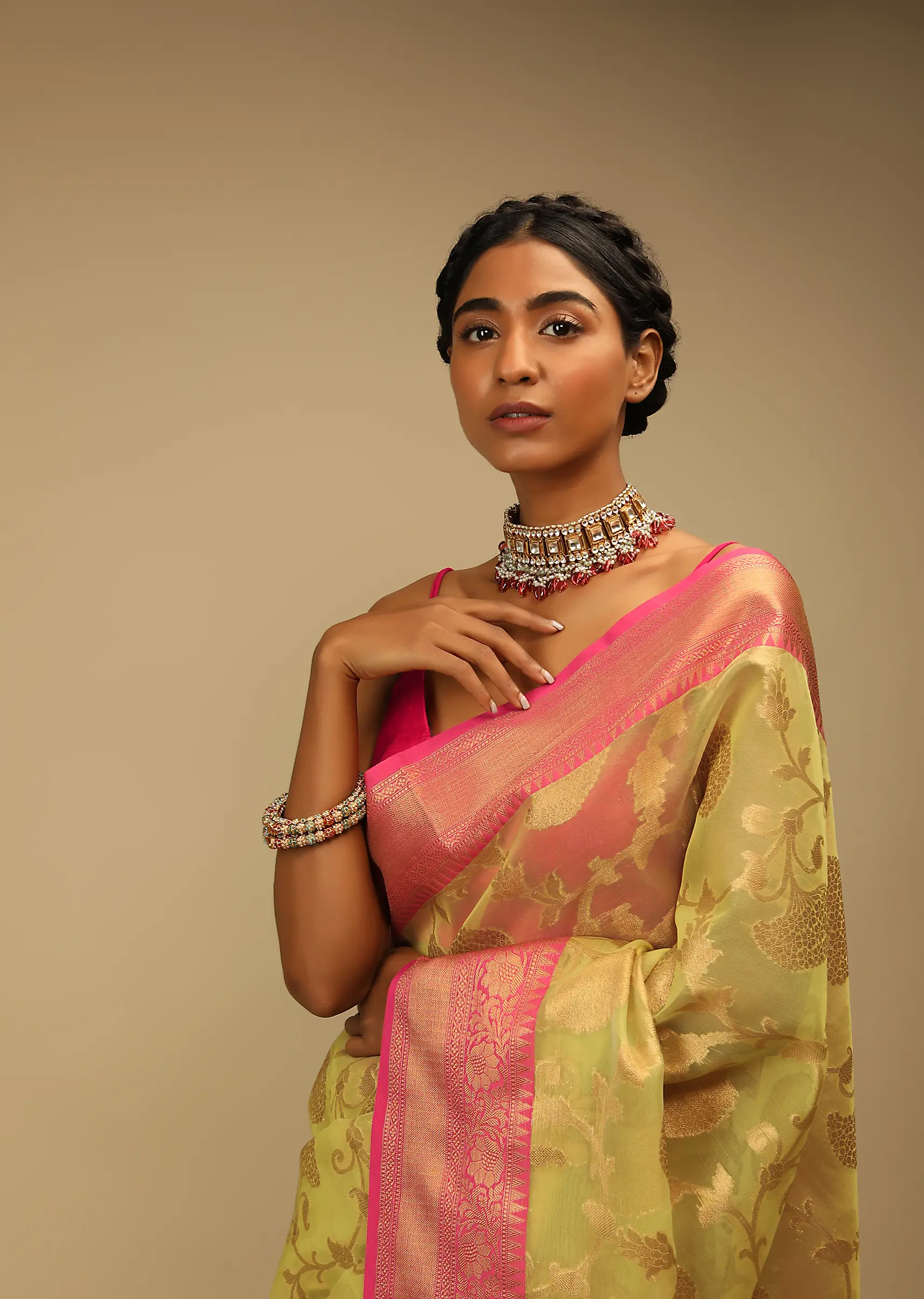 celery_green_saree_in_organza_silk_with_golden_brocade_woven2.webp