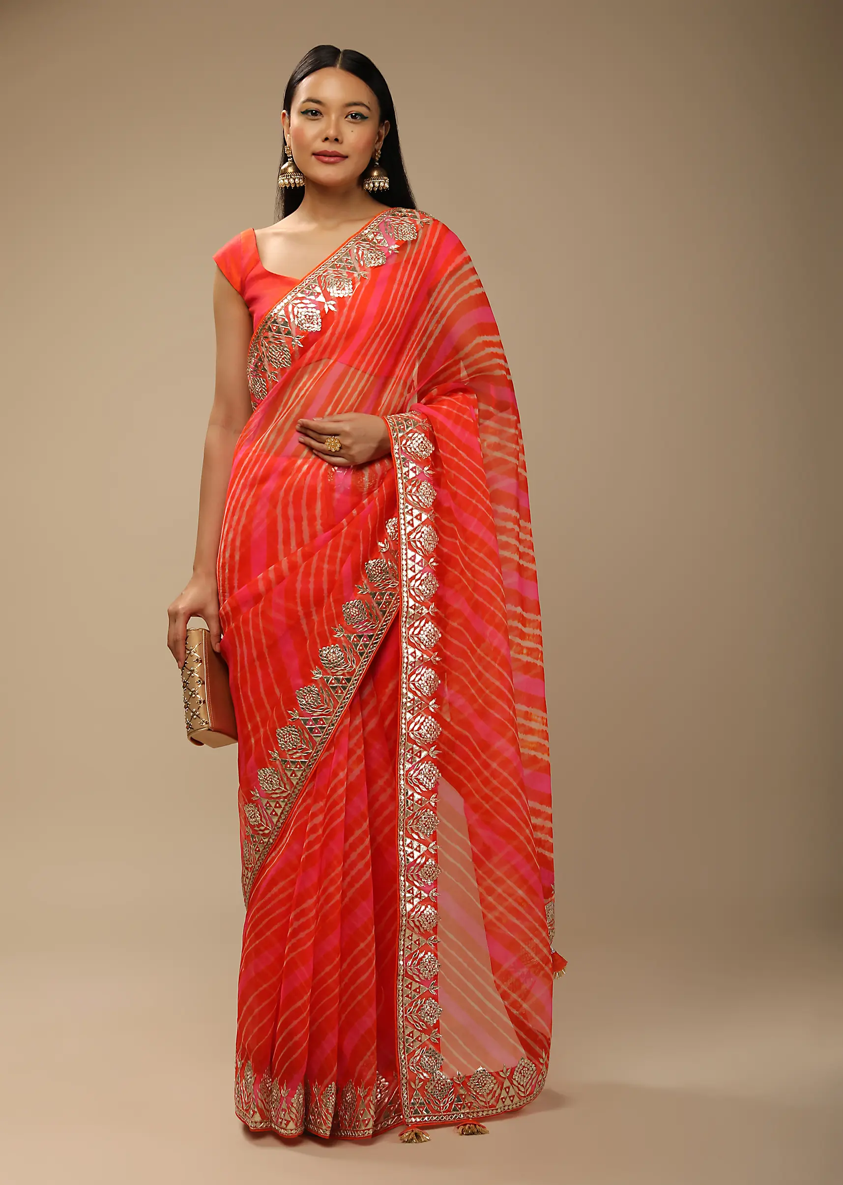orange_and_fuchsia_dual_toned_saree_in_organza_with_lehariya4.webp